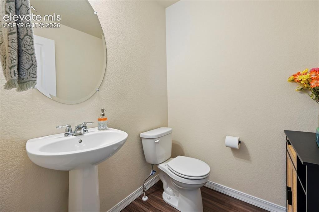 Image 4 of 28: main level powder room
