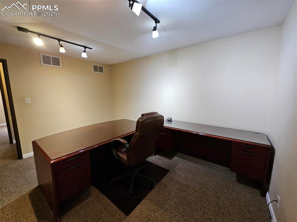 Image 8 of 16: Desk & credenza in office