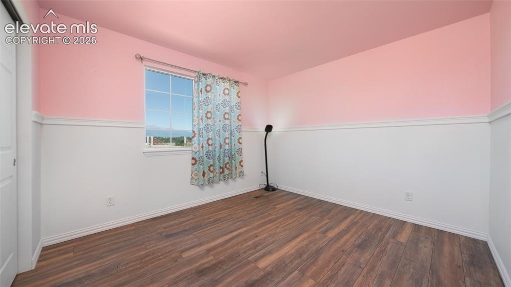 Image 30 of 47: Secondary bedroom, Pikes Peak view