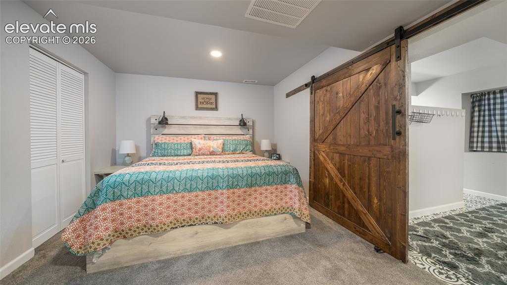 Image 34 of 47: Basement bedroom area