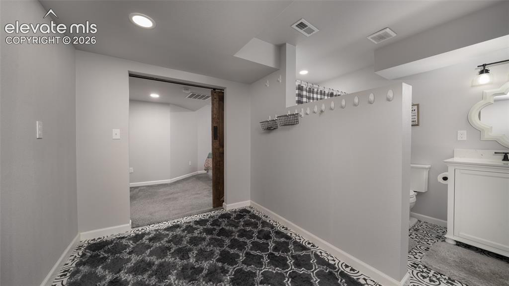Image 36 of 47: Basement bath open area