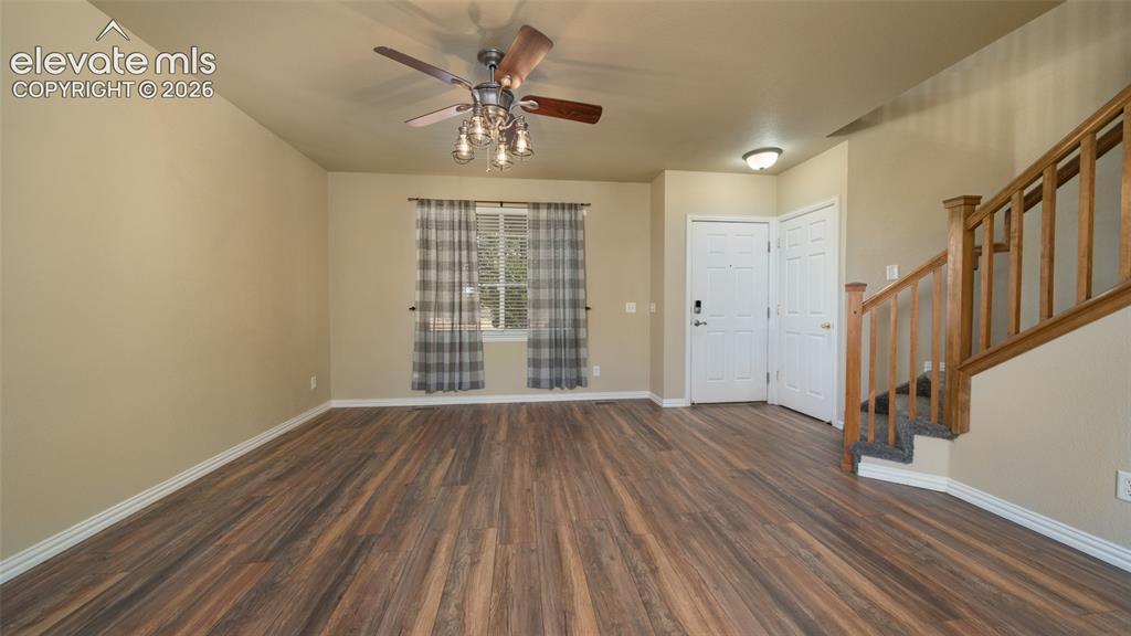 Image 4 of 47: Living room, luxury vinyl