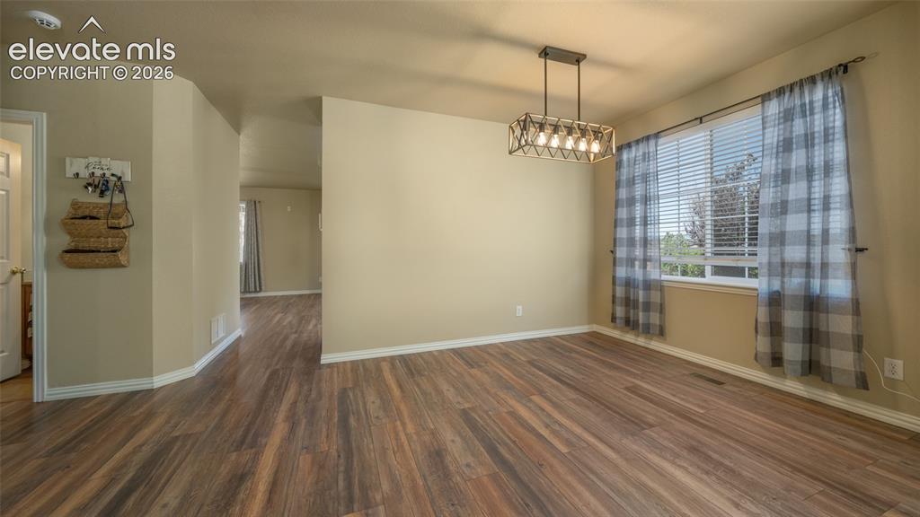 Image 7 of 47: Dining room, luxury vinyl