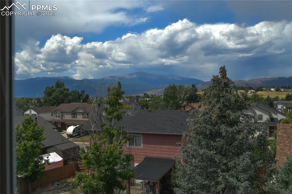 Image 47 of 48: Mountain view featuring nearby suburban area