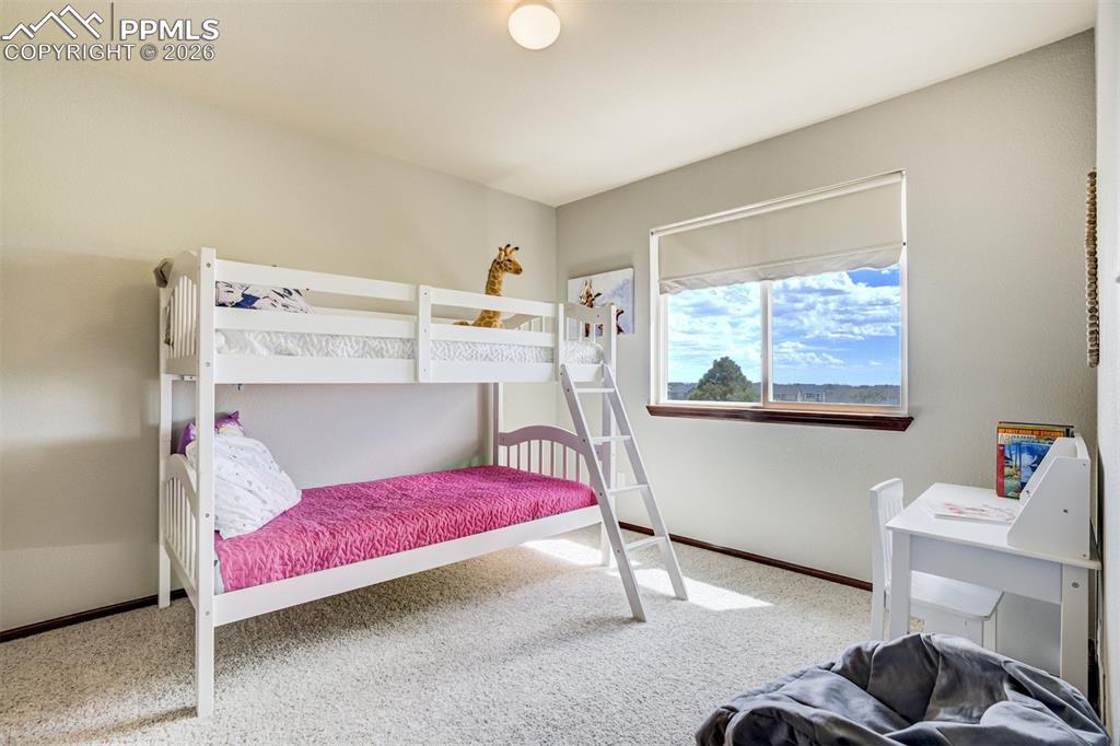 Image 30 of 45: With a built-in vanity, getting ready for the day feels less like a task an