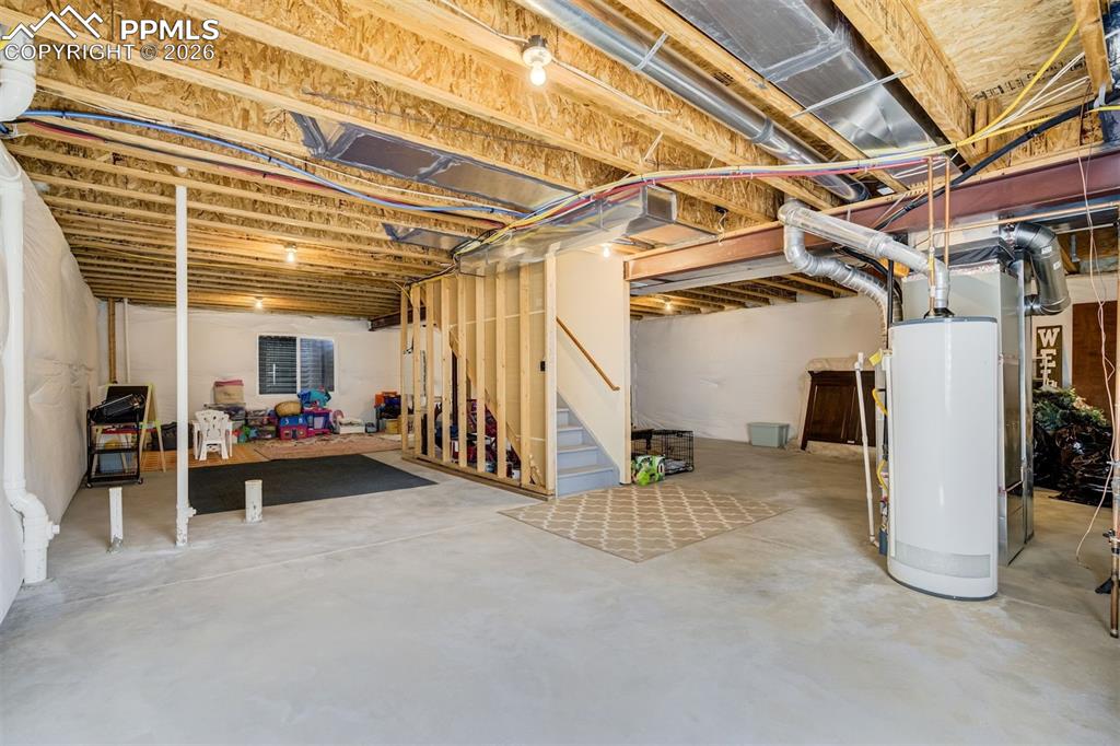 Image 33 of 45: Upstairs bedroom #2 with walk-in closet and plush carpet