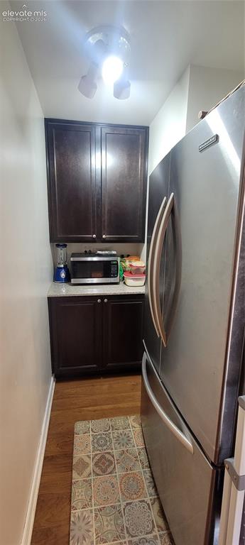Image 10 of 30: Pantry with cabinets and countertop area