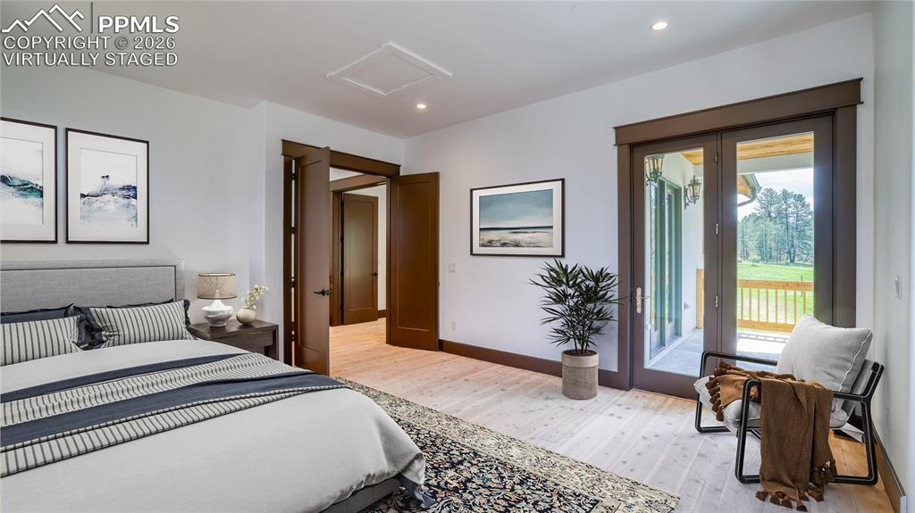 Image 11 of 37: VIRTUALLY STAGED - MASTER BEDROOM SUITE