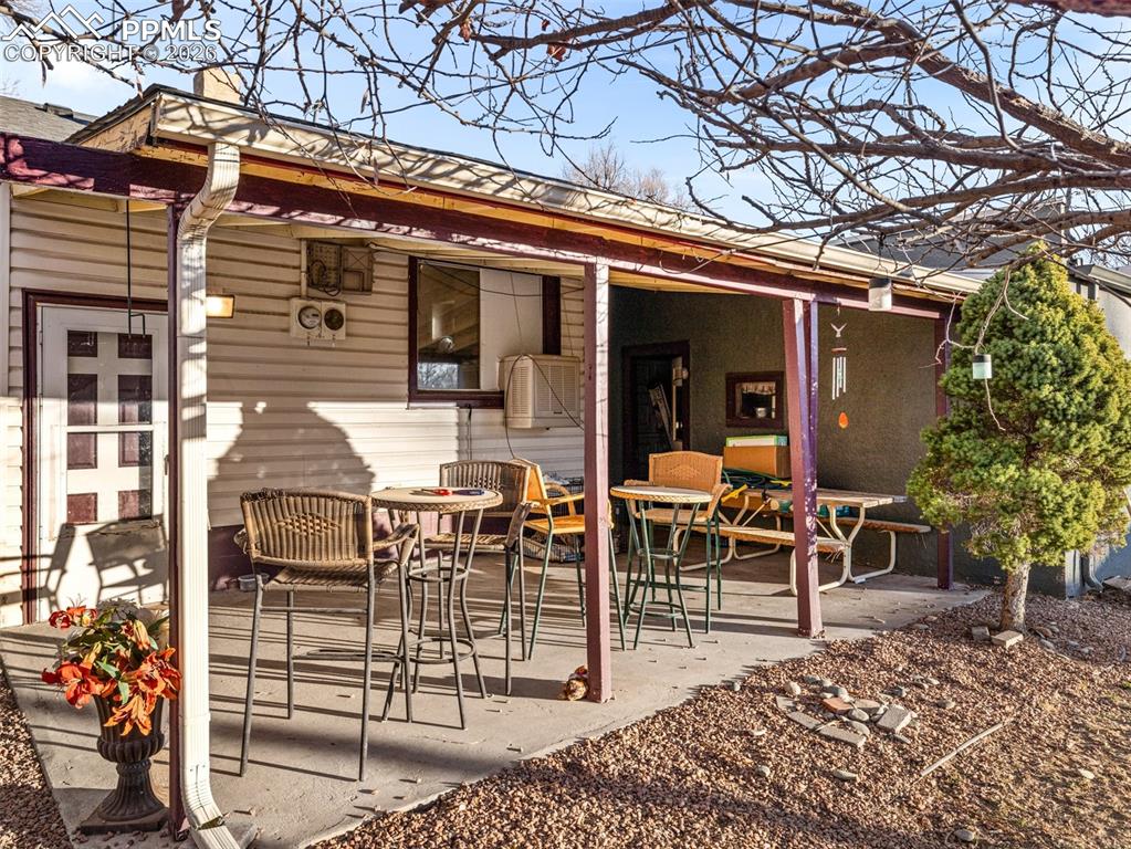 Image 22 of 25: Covered back patio