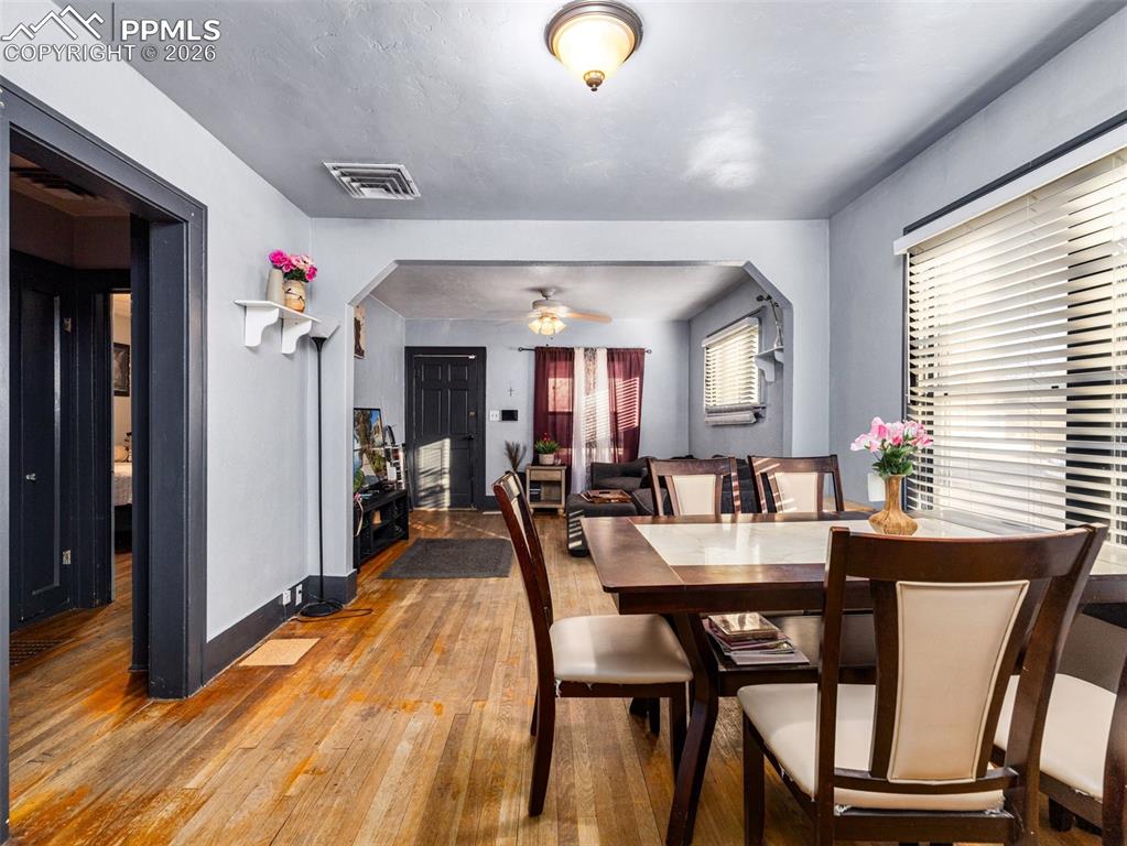 Image 5 of 25: View from kitchen into dining and living room