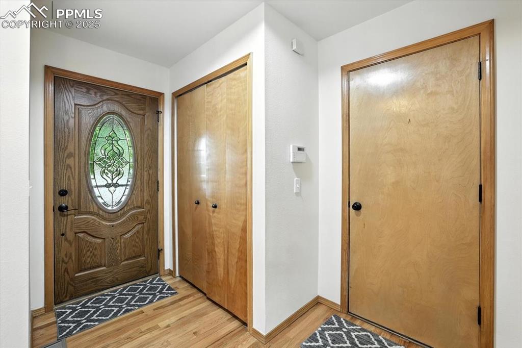 Image 31 of 41: Half bath on main floor has granite countertops and undermount sink