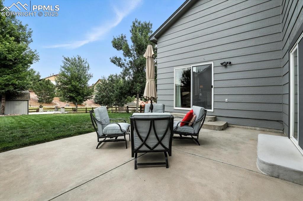 Image 33 of 41: Garage has easy access to back yard and loft storage