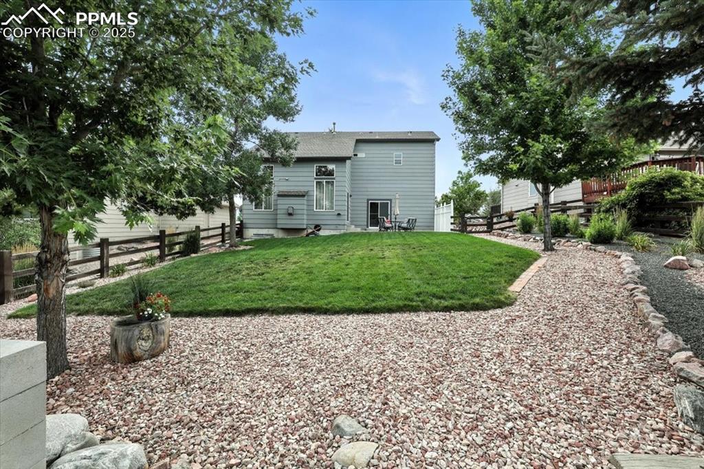 Image 37 of 41: Landscaping was recently refreshed and offers mature trees for fall color a