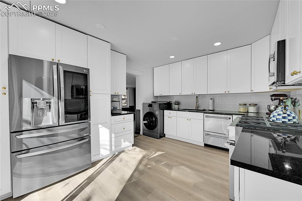 Image 10 of 47: Soft-close cabinets and tons of storage space!