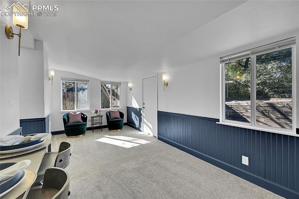 Image 18 of 47: Ideal flex space for reading nook, gym, home office, dining area, etc.