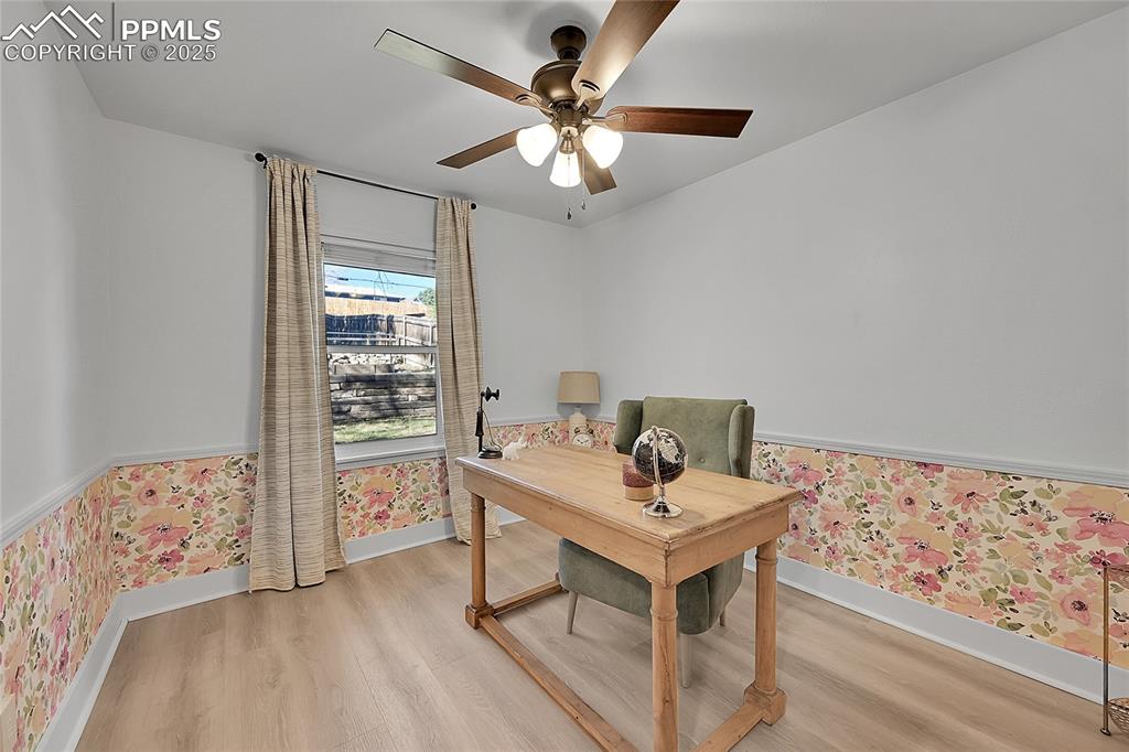 Image 26 of 47: Bedroom makes a great office or flex space.