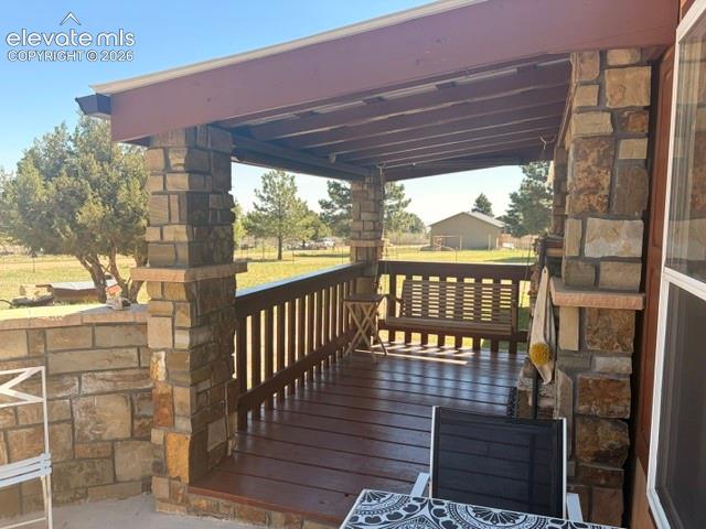 Image 7 of 39: Front covered Porch 13x8, includes swing!