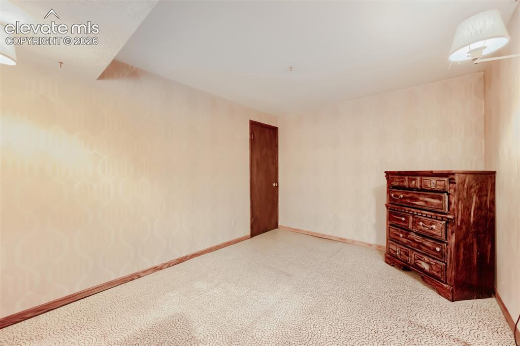 Image 19 of 28: Basement flex room-possible 5th bedroom