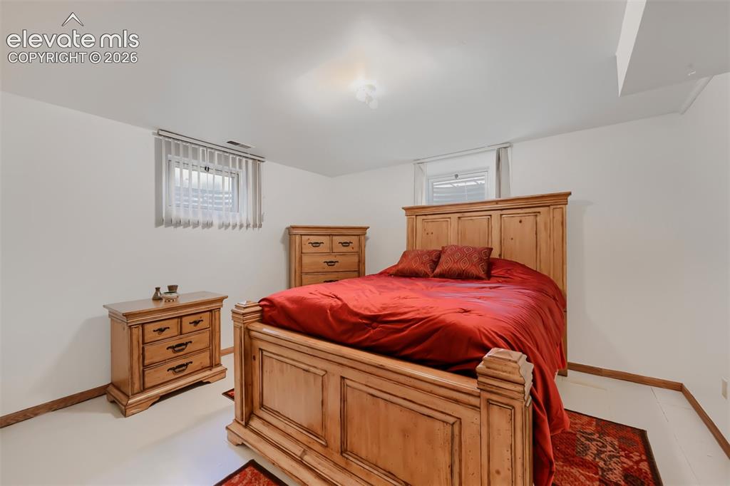 Image 22 of 28: Spacious basement bedroom