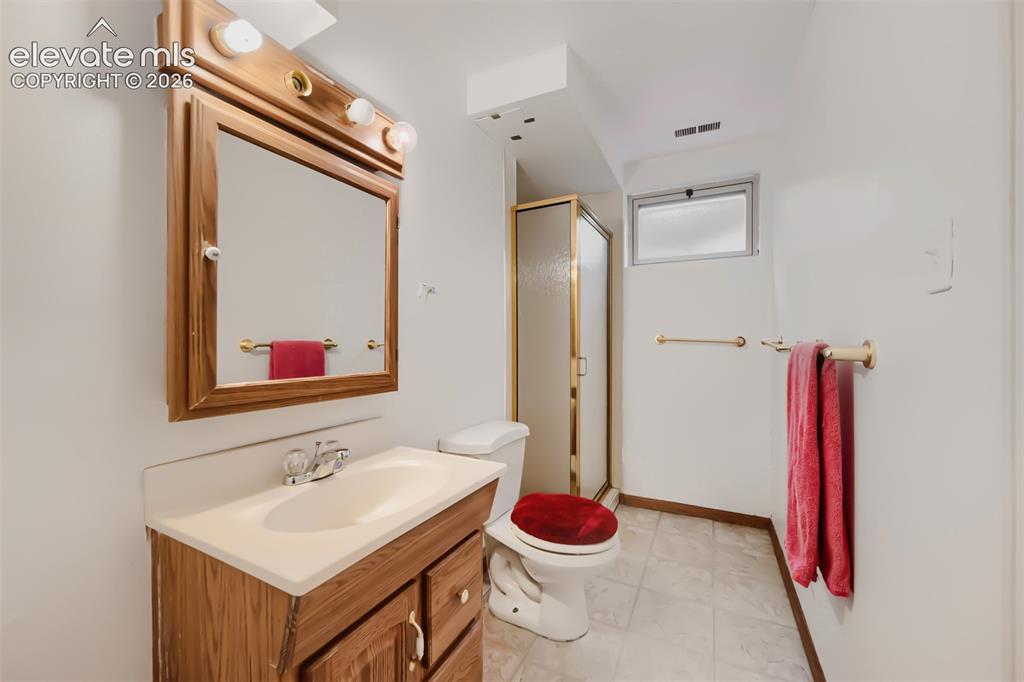 Image 24 of 28: Basement Bathroom