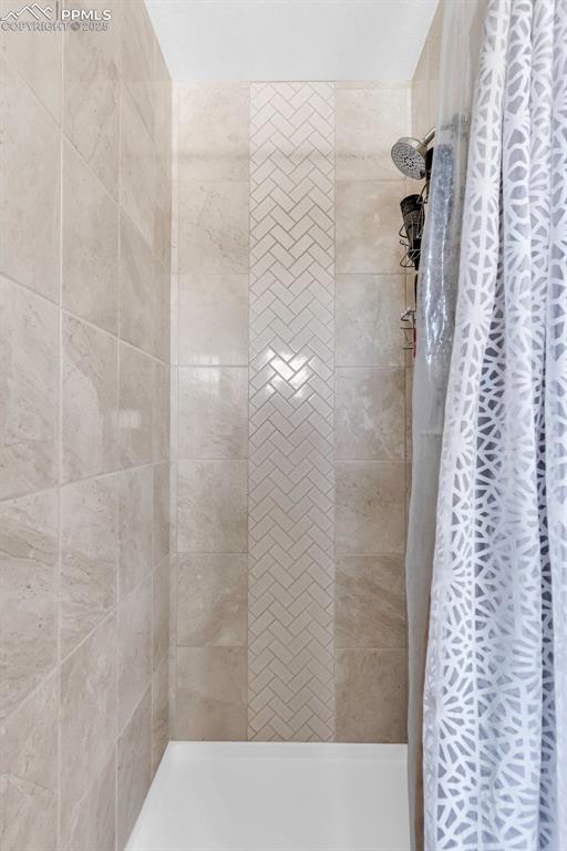 Image 22 of 49: Newly tiled