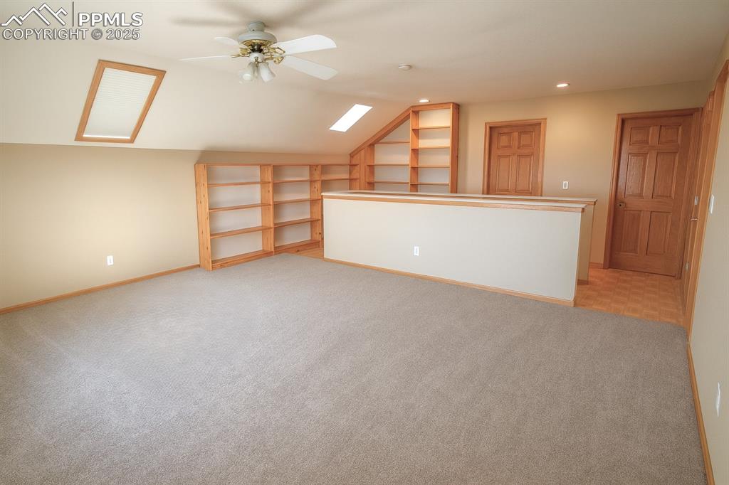 Image 27 of 49: With built-in bookcases