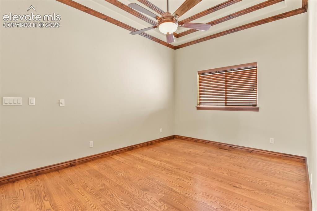 Image 13 of 33: Formal dining room with custom ceilings
