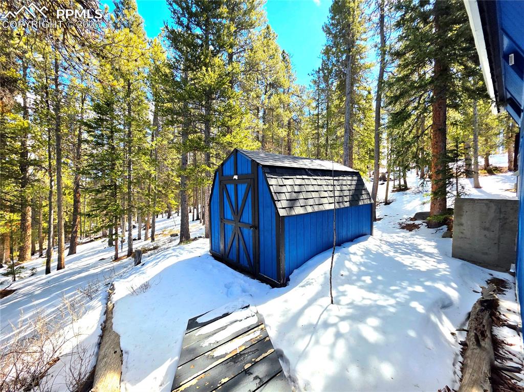 Image 32 of 40: 8 x 12 storage shed for skis, snowboards and all your winter fun gear