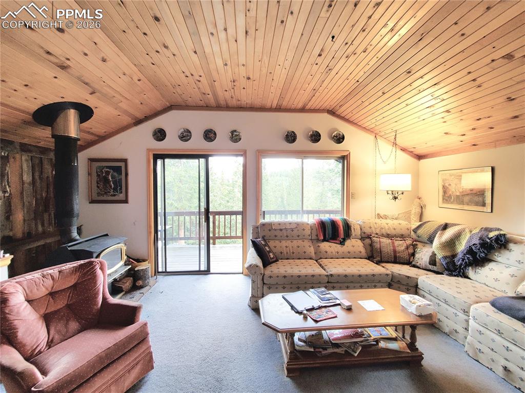 Image 8 of 40: Looking towards balcony from living area