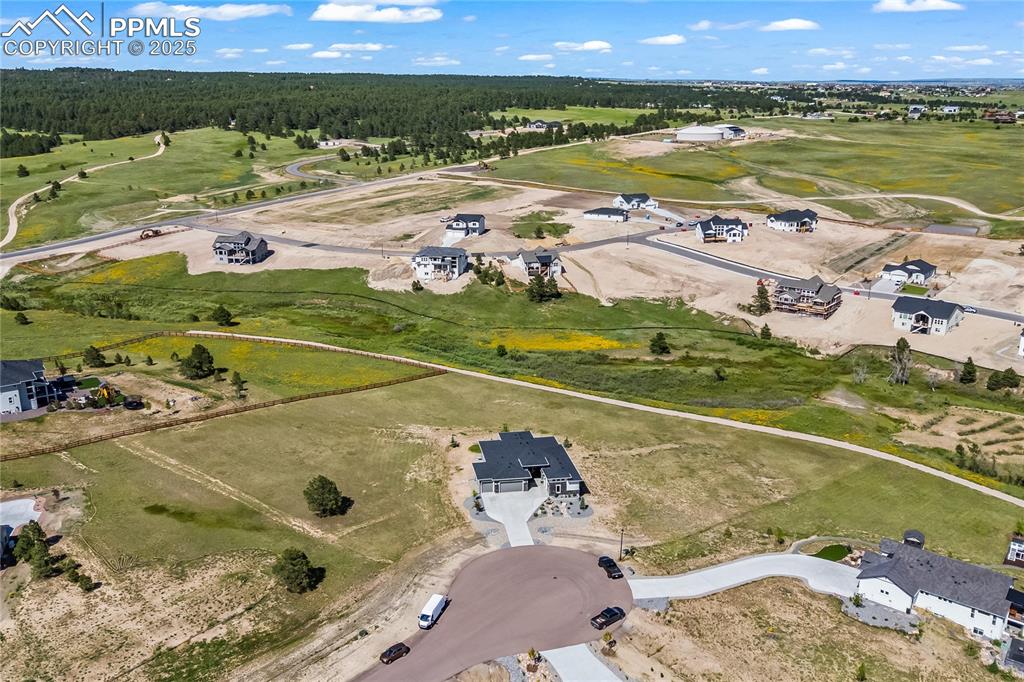 Image 4 of 50: View of property location featuring a forest