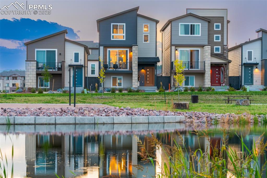 Caption: East-facing unit with park and pond views. Wake up to Colorado Springs’ best sunrises