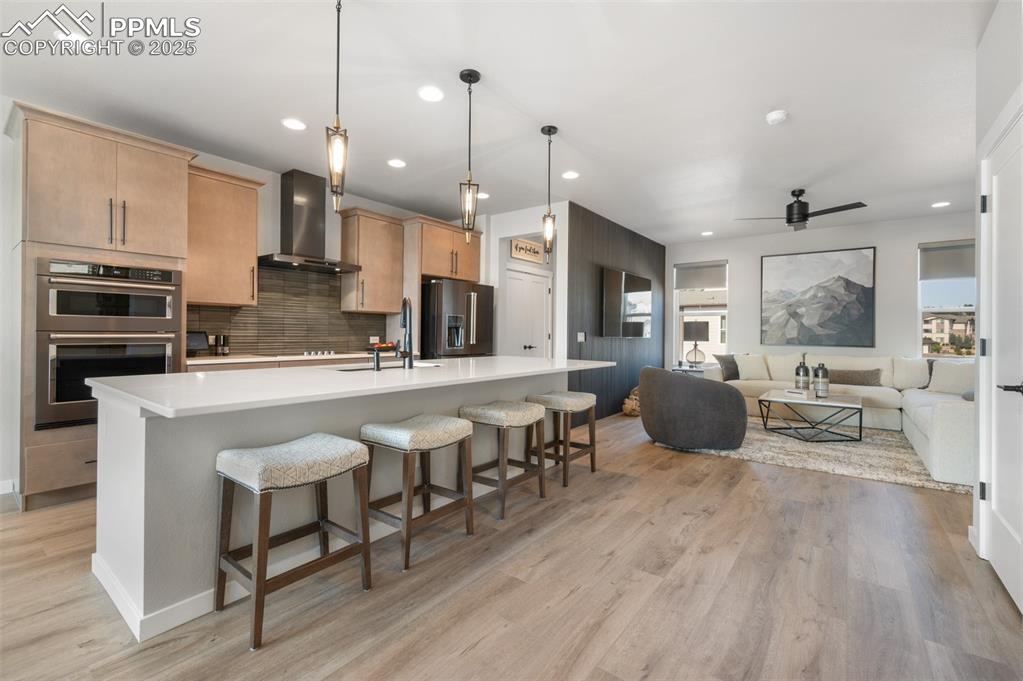 Image 2 of 27: High-end upgrades from floor to ceiling, with designer lighting and sweepin