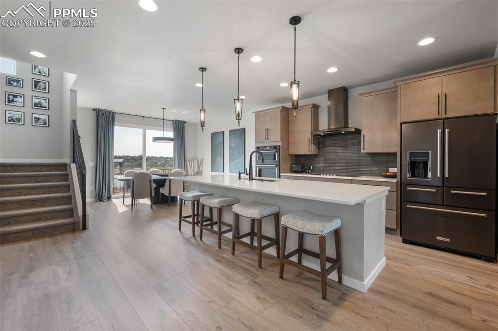 Image 4 of 27: soft-close cabinetry, oversized drawers, quartz counters, and premium Kitc