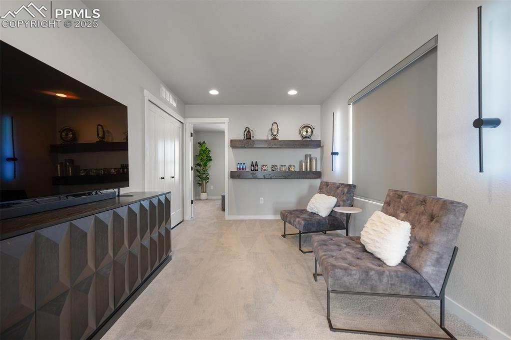 Image 9 of 27: Thoughtfully appointed loft, perfect for movie nights, game day, or casual