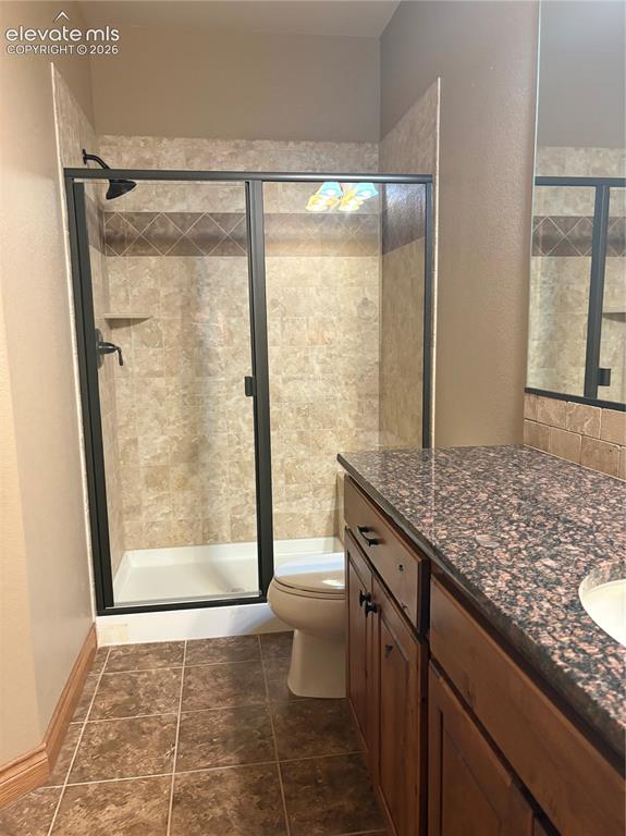 Image 28 of 44: Shower in bathroom attached to lower back bedroom