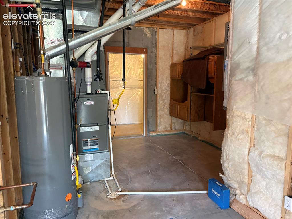 Image 37 of 44: Utility room in lower level