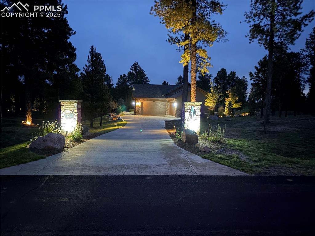 Image 4 of 44: Lighting on the external of the house is on timers