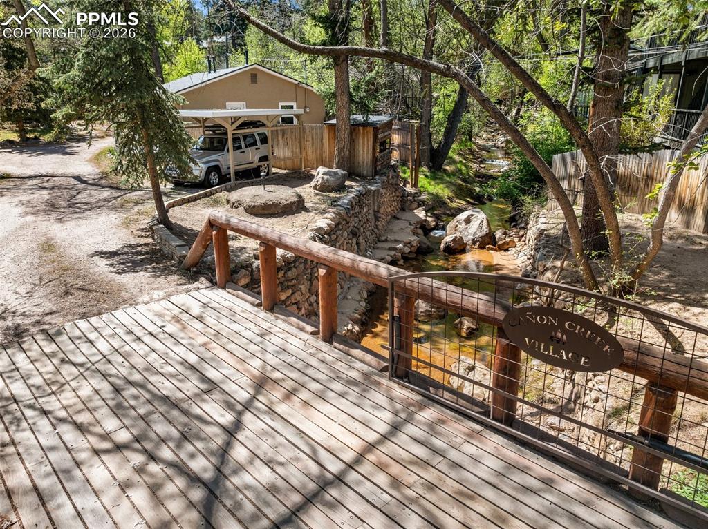 Image 6 of 34: The Canon Creek Village subdivision lives up to its name with this creek as