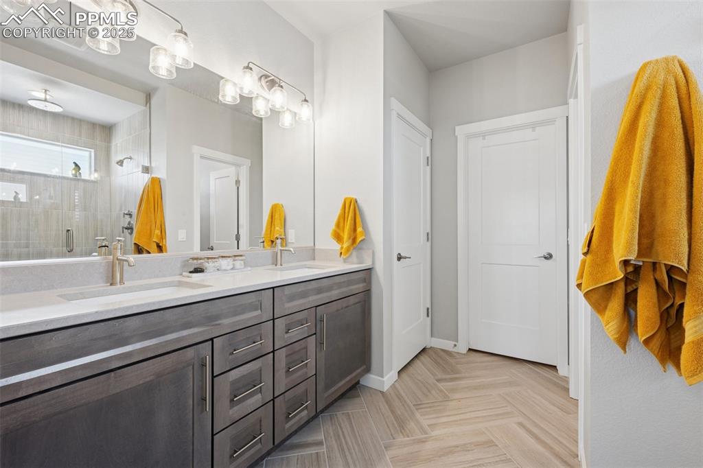 Image 21 of 45: Spa like master bath with quartz counters and upgraded tile!