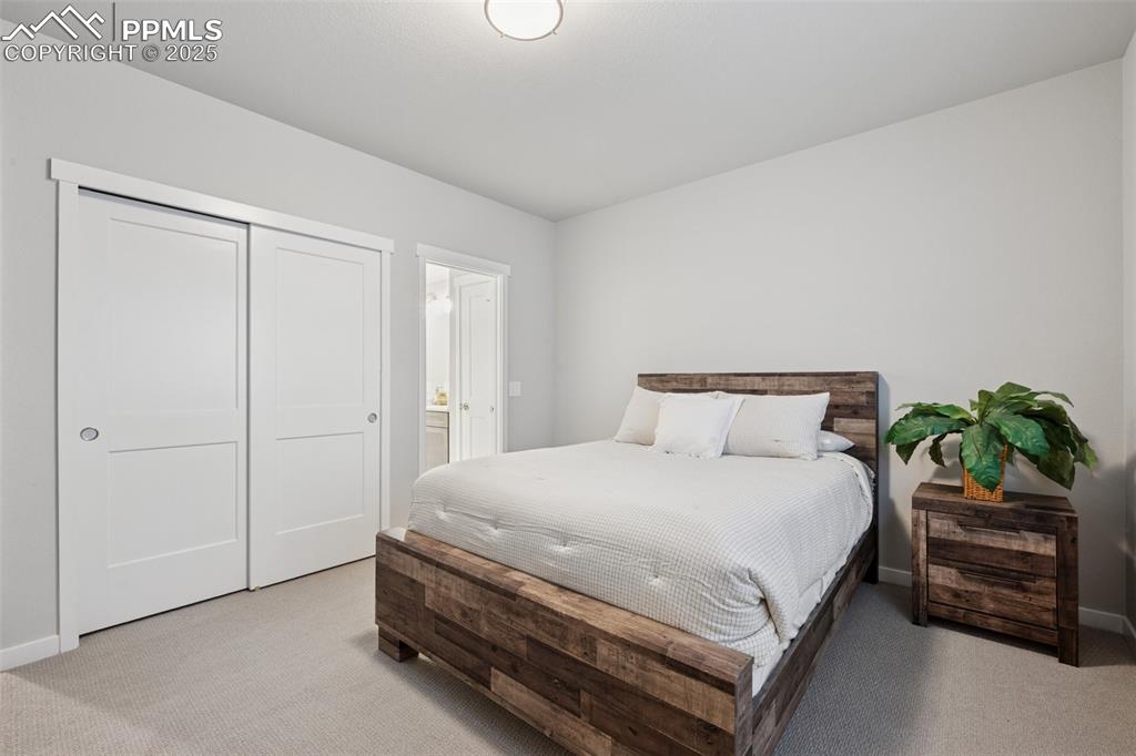 Image 41 of 45: Another view of bedroom #5 showing jack-n-jill bath!