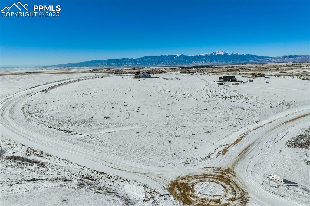 Image 5 of 20: Property view of water featuring a mountain view