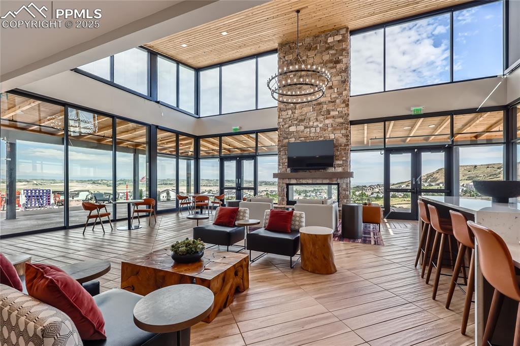Image 43 of 44: Common area with a high ceiling