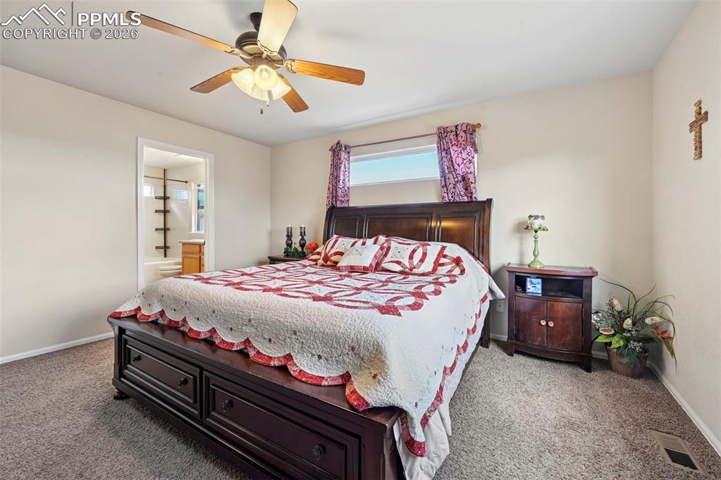 Image 20 of 44: Primary bedroom on second floor.