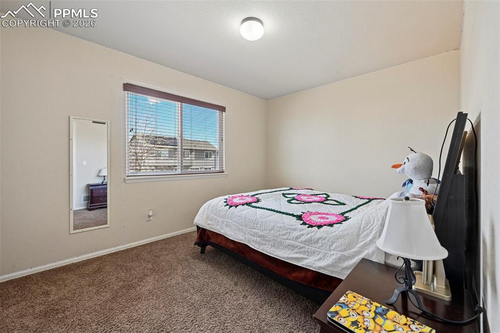 Image 28 of 44: Second level bedroom #3.