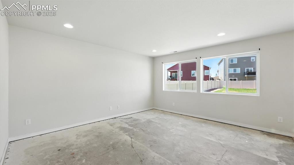 Image 10 of 50: Spacious Living Room great for entertaining family and friends.