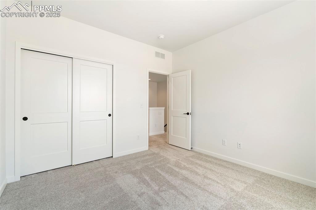 Image 33 of 36: Bedroom