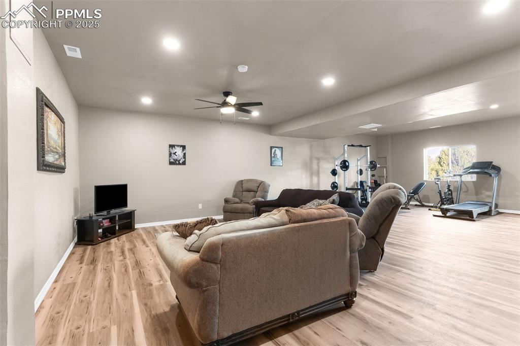 Image 23 of 37: Massive space in the walk out basement for entertaining, game room and or g