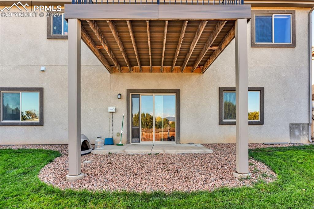 Image 36 of 37: Walk out basement with patio space