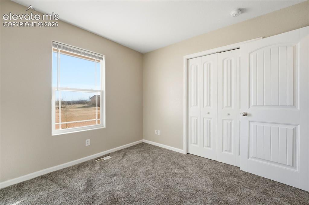 Image 18 of 50: Bedroom
