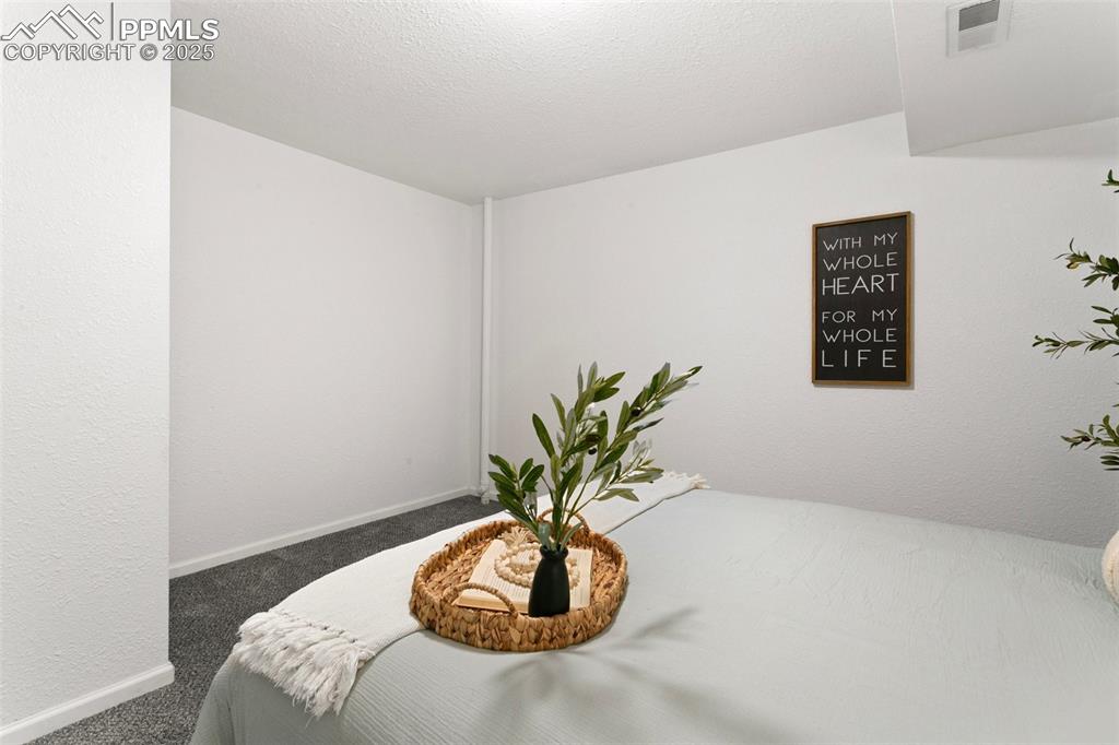 Image 32 of 36: Bedroom
